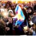 Polémica en Francia: quemaron una bandera de Argentina y usaron una camiseta de Messi como alfombra